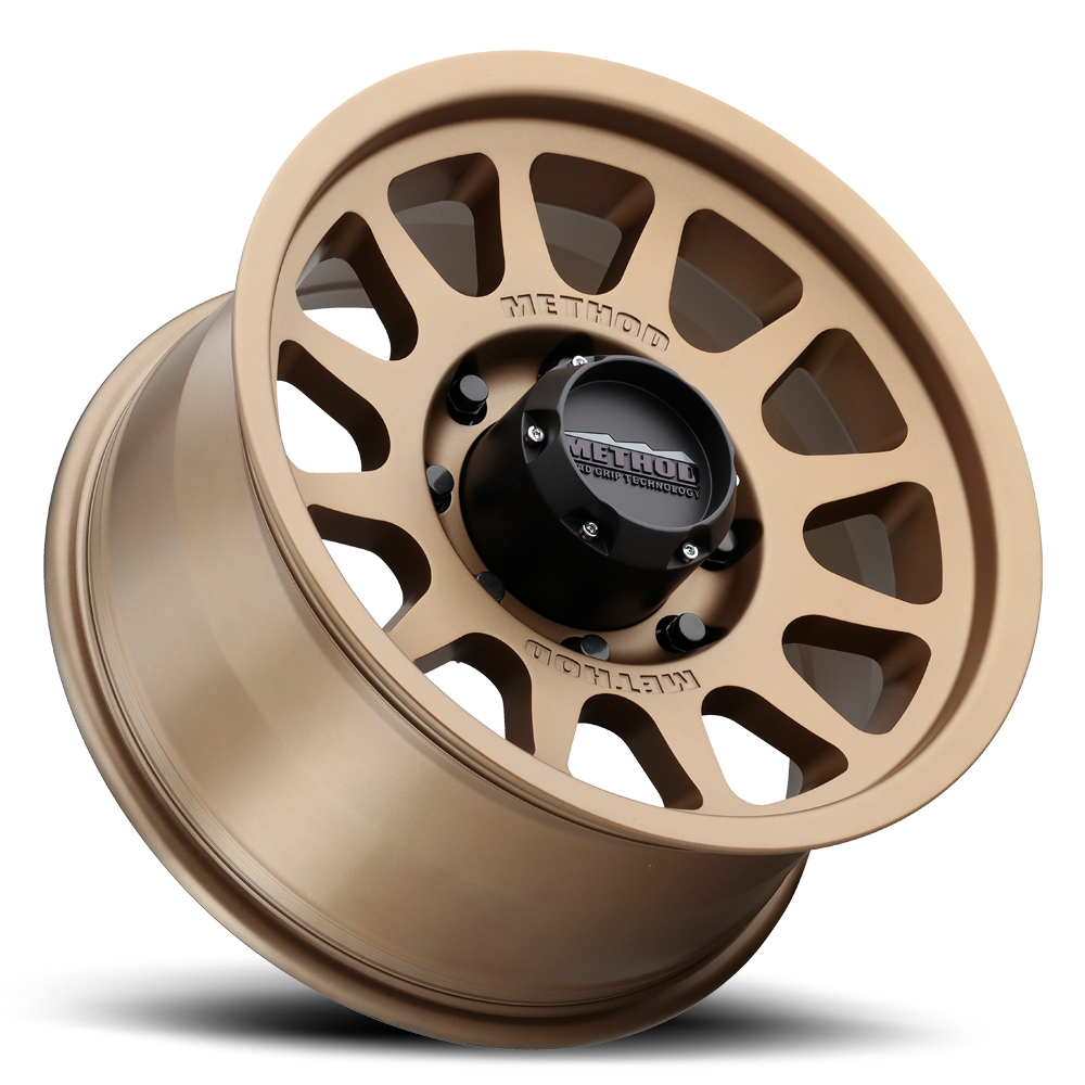 Aluminum Wheels 17x9 Bead Grip MR703 Bolt Pattern 8 On 165.1 Offset -12 Lip Size 1.18 Method Bronze BRZ Method